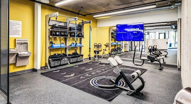 Gym equipment exercise mat and screen Gym at Theory U District in Seattle Student Accommodation