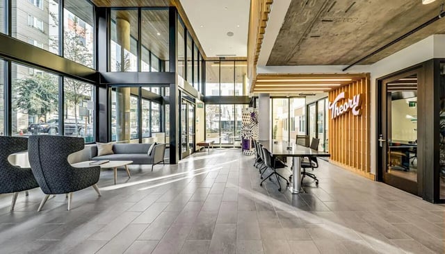 Lobby with lounge area and conference table lounge area at Theory U District in Seattle Student Accommodation