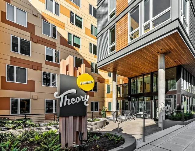 Modern apartment building with large windows and entrance exterior at Theory U District in Seattle Student Accommodation