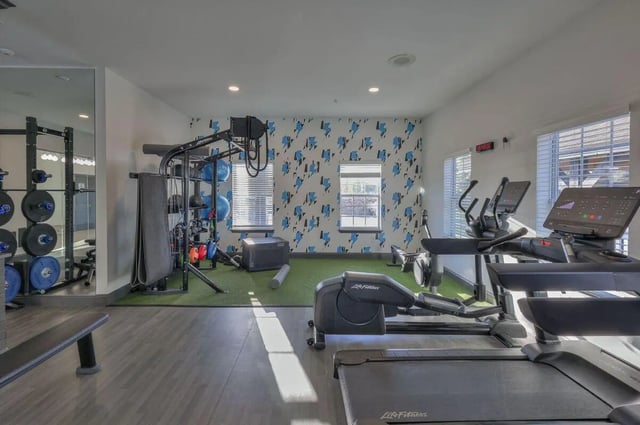 Gym equipment weights bench and treadmills gym at Cobalt Row in Murfreesboro Student Accommodation