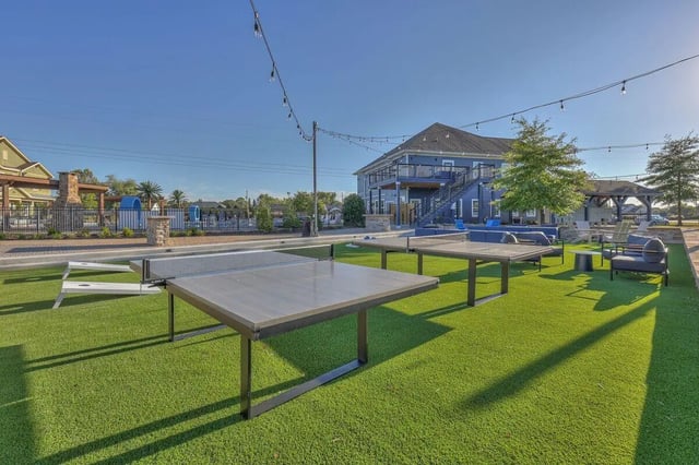 Ping pong tables on artificial grass exterior at Cobalt Row in Murfreesboro Student Accommodation