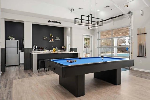 Pool table refrigerator and bar game room at The Gathering in Salisbury Student Accommodation