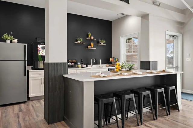 Refrigerator coffee machine counter with stools kitchen at The Gathering in Salisbury Student Accommodation