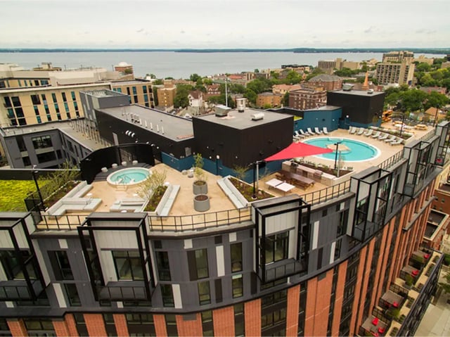 Rooftop pool hot tubs lounge areas exterior at The James in Richmond Student Accommodation