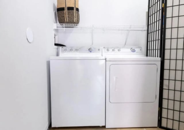 White washer dryer basket on shelf Laundry room at East Edge in Tuscaloosa Student Accommodation