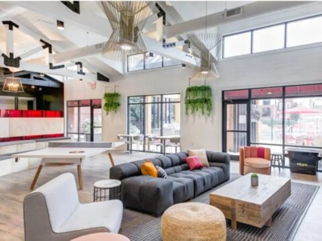 Modern lounge with ping pong table and seating area Living room at East Edge in Tuscaloosa Student Accommodation