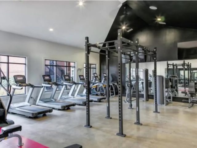 Treadmills weight racks and gym equipment fitness area at East Edge in Tuscaloosa Student Accommodation