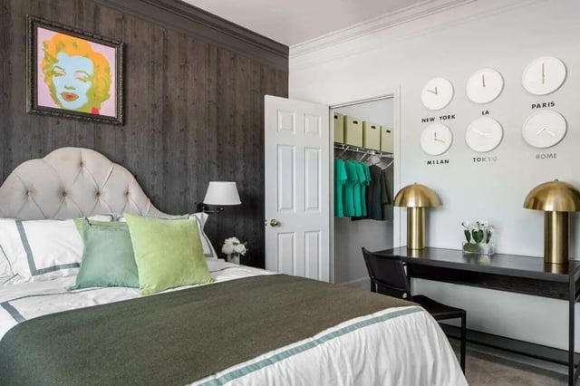 Bedroom with Marilyn Monroe art and world clocks bedroom at The George in Statesboro Student Accommodation