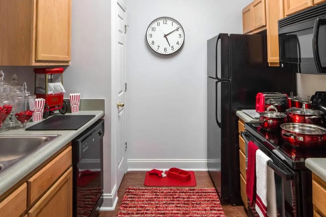 Popcorn machine pots clock and refrigerator kitchen at The George in Statesboro Student Accommodation