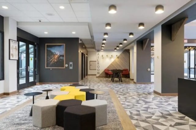 Honeycomb seating and tables in lobby area at The Quad On Delaware in Minneapolis Student Accommodation