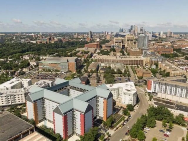 Aerial view of apartments and city skyline exterior at The Quad On Delaware in Minneapolis Student Accommodation