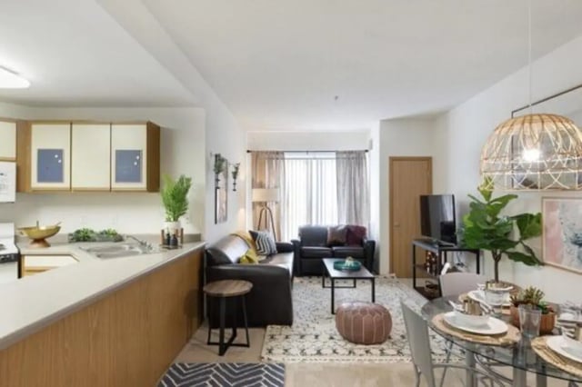 Kitchen living and dining area living room at The Quad On Delaware in Minneapolis Student Accommodation