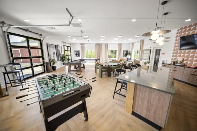 Foosball table pool table lounge area recreation room at Block20