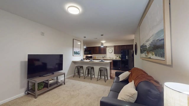 Sofa TV kitchen island stools living room at Block20