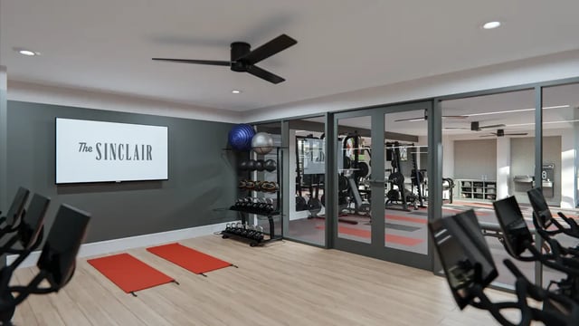 Exercise bikes yoga mats weight rack gym equipment fitness room at The Sinclair in Austin Student Accommodation