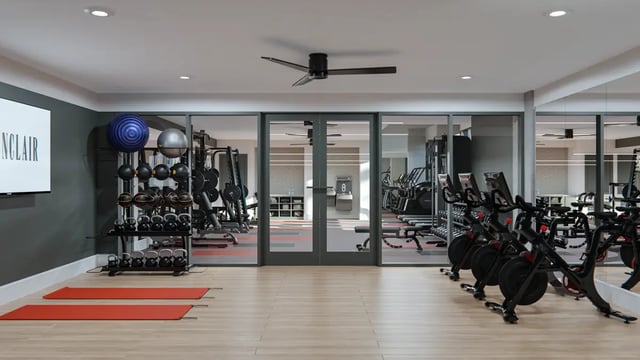 Weight racks exercise bikes and mats gym at The Sinclair in Austin Student Accommodation