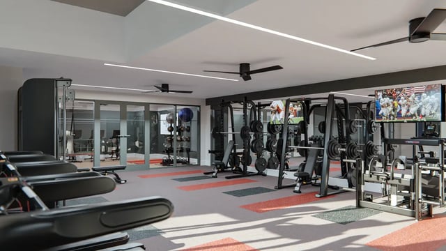 Treadmills weight racks televisions gym equipment gymnasium at The Sinclair in Austin Student Accommodation