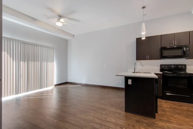 Ceiling fan sliding door and modern kitchen living room at 800 South in Springfield Student Accommodation