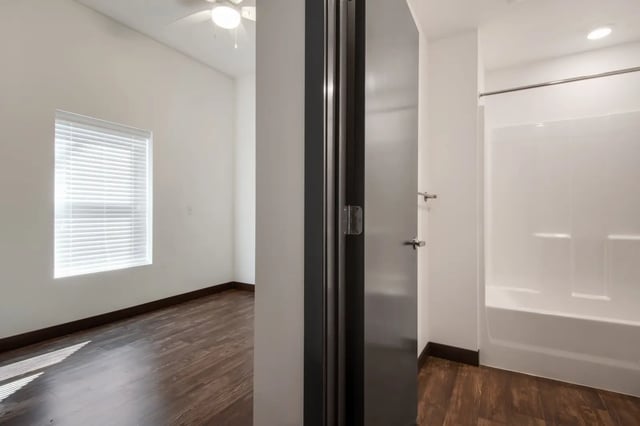 Doorway to bathroom and empty bedroom bathroom at 800 South in Springfield Student Accommodation