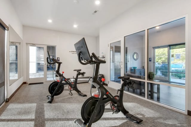 Spin bikes and treadmill in gym area at 800 South in Springfield Student Accommodation