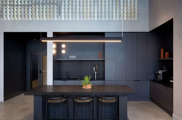 Island with stools modern kitchen with appliances kitchen at Straits Row in Chicago Student Accommodation