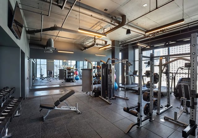 Weight rack bench treadmill and weights gym at Straits Row in Chicago Student Accommodation
