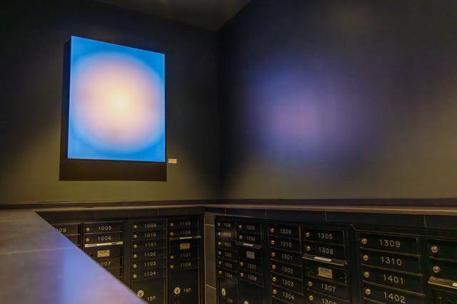 Mailboxes with artwork in hallway exterior at Straits Row in Chicago Student Accommodation