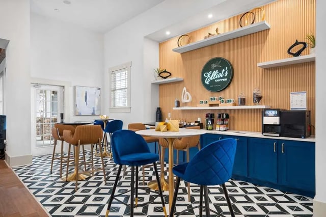 Bar stools tables coffee station common area at Astoria in Denton Student Accommodation