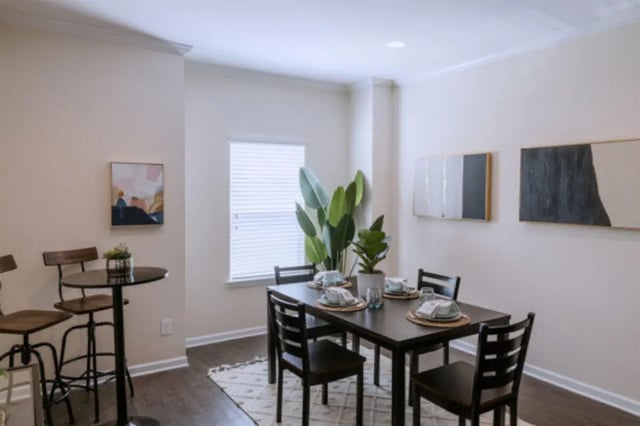 Dining table with chairs bar table with stools dining area at Athens Ridge in Athens Student Accommodation