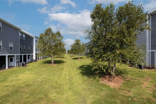 Apartment buildings and green lawns exterior at Athens Ridge in Athens Student Accommodation