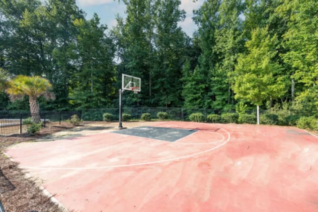 Basketball hoop and court surrounded by trees playing area at Athens Ridge in Athens Student Accommodation