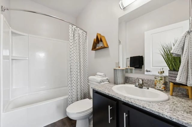 Shower toilet sink vanity and mirror bathroom at The Valley Apartments & Townhomes in State College Student Accommodation