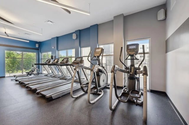 Treadmills ellipticals rowing machine fitness center at The Valley Apartments & Townhomes in State College Student Accommodation