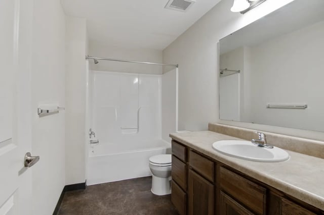 Shower tub toilet vanity sink mirror bathroom at The Jefferson Apartments in Springfield Student Accommodation