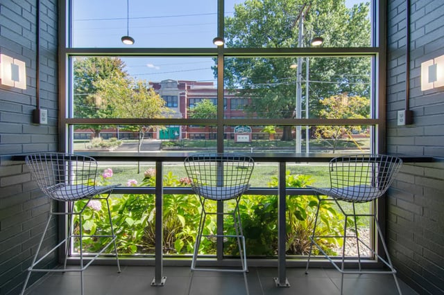 Three wire chairs at counter window view Study area at The Jefferson Apartments in Springfield Student Accommodation