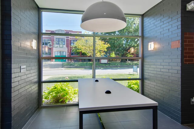 White table two black grommets large window study area at The Jefferson Apartments in Springfield Student Accommodation