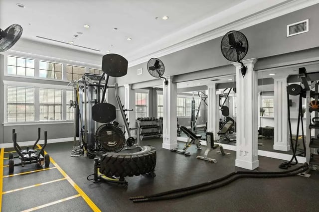 Weight machines tire dumbbells workout ropes gym at Campus Quarters in Corpus Christi Student Accommodation