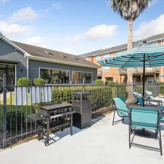 Grill seating area outdoor community lounge at Eighteen18 at Southern in Statesboro Student Accommodation