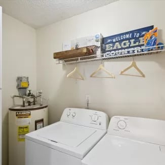 Washer dryer water heater storage area laundry room at Eighteen18 at Southern in Statesboro Student Accommodation