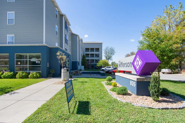 Apartment building sign and entryway exterior at Deep Elm, Elevate Student Living in Springfield Student Accommodation