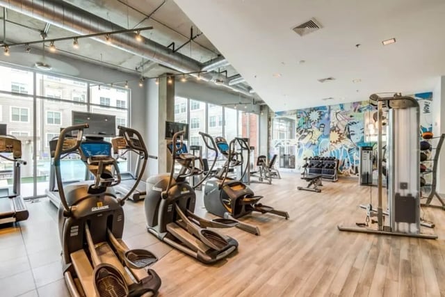 Elliptical machines and weights gym area at The Boundary At West End in Greenville Student Accommodation