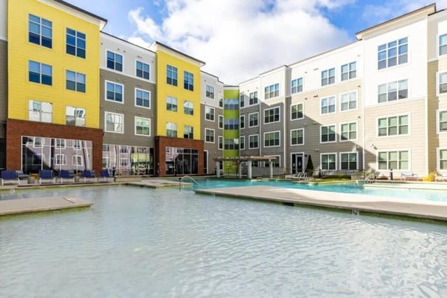 Modern apartments colorful facade large pool exterior at The Boundary At West End in Greenville Student Accommodation