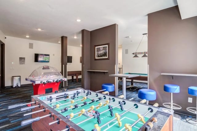 Foosball tables arcade game pool table lounge area at The Knoll Dinkytown in Minneapolis Student Accommodation