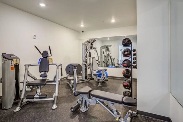 Workout machines weight rack medicine balls gym at The Knoll Dinkytown in Minneapolis Student Accommodation