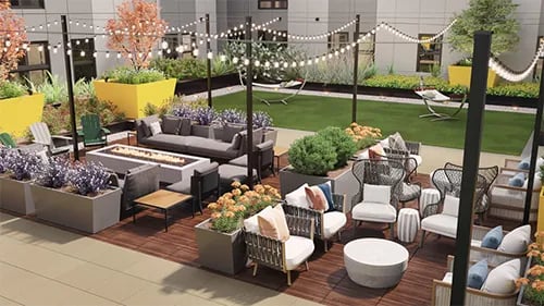 Rooftop patio with fire pit and seating outdoor lounge area at Uncommon Boise State in Boise Student Accommodation