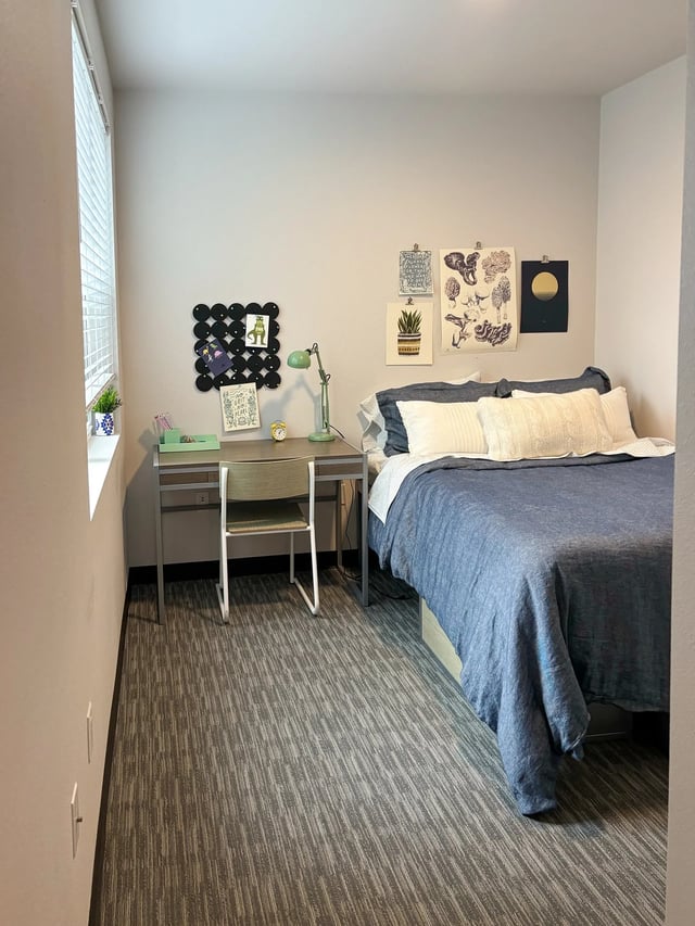 Desk, chair, bed, window, wall art bedroom at Fifteen51 in Reno Student Accommodation