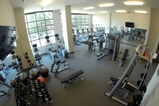 Treadmills weight machines exercise balls gym equipment gym at The Knox Apartments in Knoxville Student Accommodation