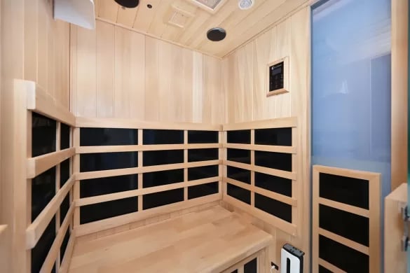 Wooden sauna with benches and control panel Sauna at ANOVA Aggie Square in Sacramento Student Accommodation