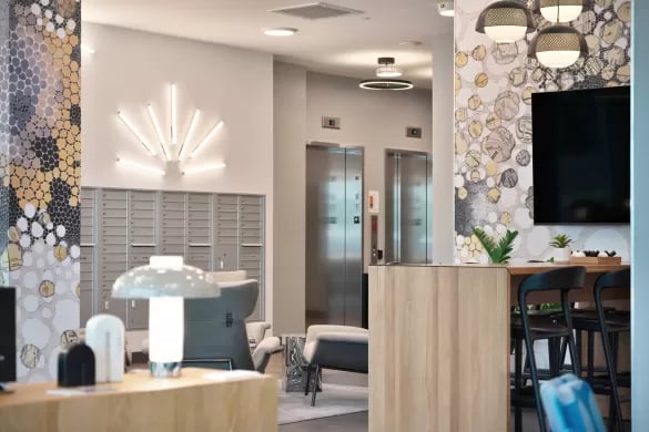Mailboxes elevators seating area lounge at ANOVA Aggie Square in Sacramento Student Accommodation