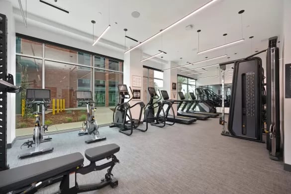 Treadmills ellipticals weight machine gym gym at ANOVA Aggie Square in Sacramento Student Accommodation